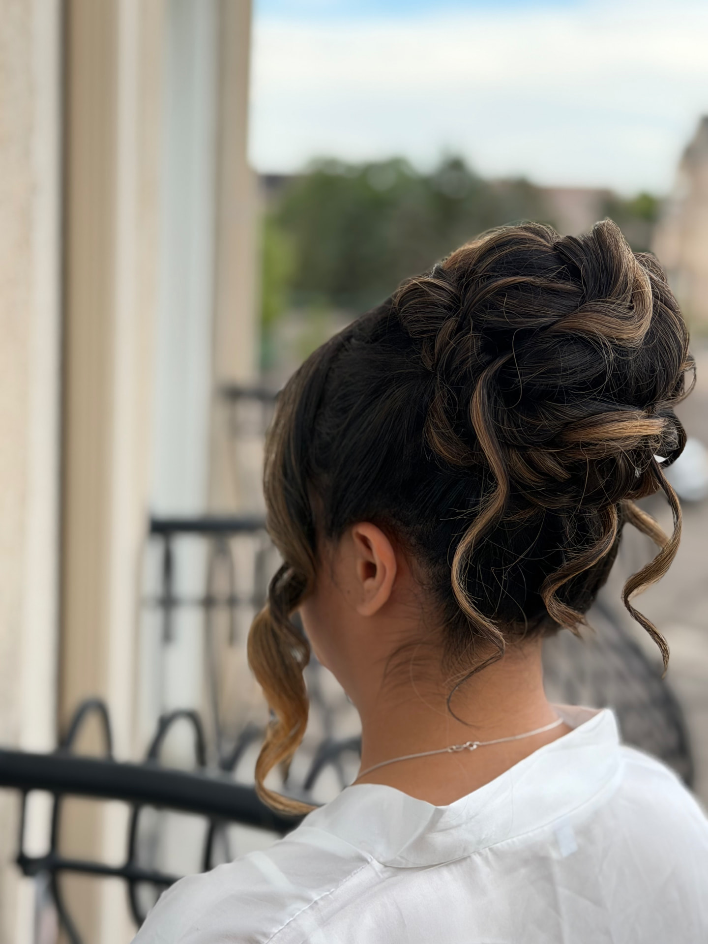 Elevated top knot